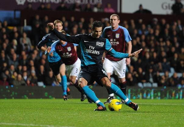 Football - Premier League - Aston Villa vs. Arsenal FC London - Arsenal s Robin van Persie scores their opening goal from the penalty spot at Villa Park, Birmingham 