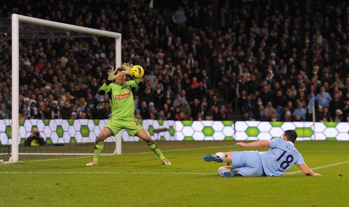 Thomas Sorensen of Stoke City saves a Gareth Barry of Manchester City volley Barclays Premier League Manchester City v Stoke City 21st December, 2011 EDITORIAL USE ONLY. No use with unauthorised audio, video, data, fixture lists, club league logos or live services. Online in-match use limited to 120 images, no video emulation. No use in betting, games or single club league player publications.