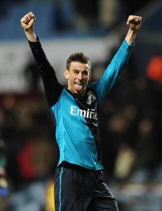 Football - Premier League - Aston Villa vs. Arsenal FC London Arsenal s Laurent Koscielny celebrates their win at the final whistle at Villa Park, Birmingham 