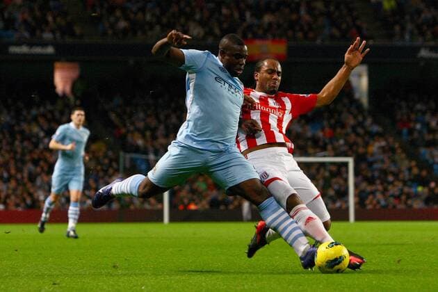 Football - Premier League - Manchester City vs. Stoke City Micah Richards of Manchester City and Stokes Cameron Jerome at the Etihad Stadium 