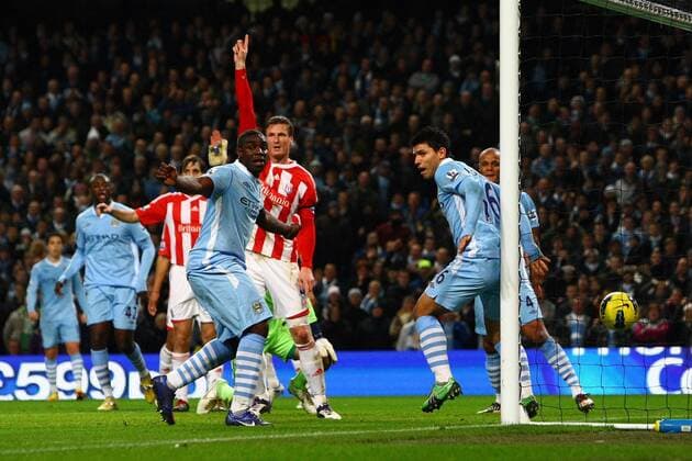 Football - Premier League - Manchester City vs. Stoke City Sergio Kun Aguero of Manchester City scores the opening goal at the Etihad Stadium 