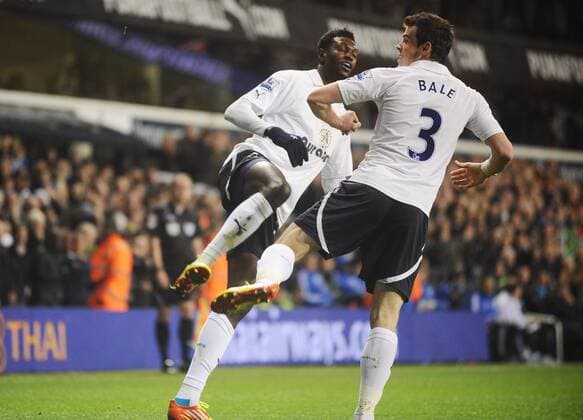 Football - Premier League - Tottenham Hotspur vs. Chelsea Emmanuel Adebayor (tott) celebrates scoring his goal with Gareth Bale. 