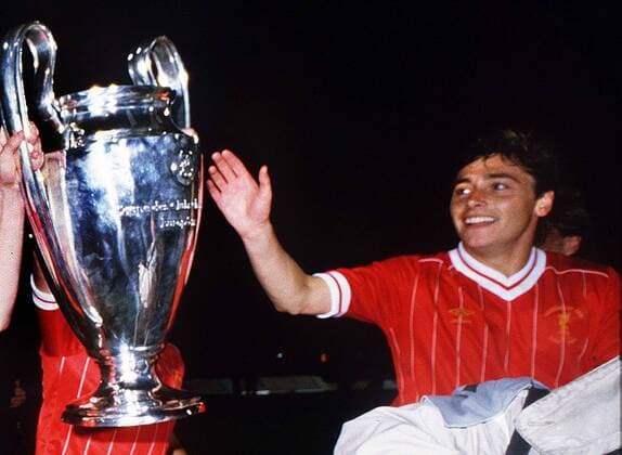 Football Michael Robinson (Liverpool) touches the trophy. Liverpool v Roma. European Cup Final 1984. 