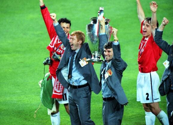 Football : Paul Scholes and Roy Keane (United) who missed playing in the final,celebrate with the trophy. Manchester United v Bayern Munich, Champions League Cup Final; 26 05 1999; Barcelona 