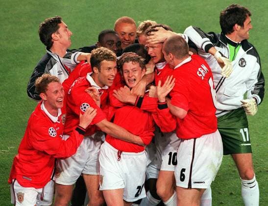 Ole Solskjaer celebrates scoring the winner for United with Ronny Johnsen and Nicky Butt . Manchester United 2:1 Bayern Munich, Champions League Cup Final, 26 05 1999. Barcelona. 