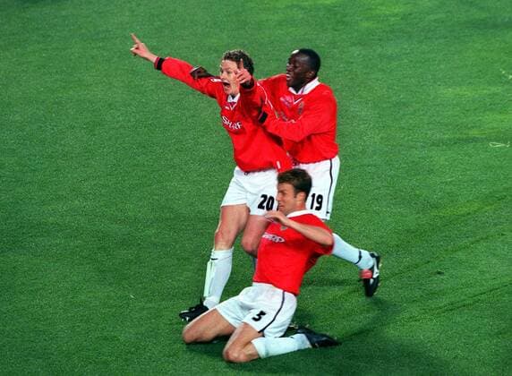 Ole Solskjaer celebrates scoring the winner for United with Dwight Yorke and Ronny Johnsen . Manchester United 2:1 Bayern Munich, Champions League Cup Final, 26 05 1999. Barcelona. 