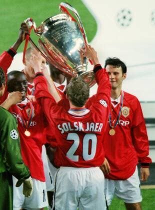 Ole Solskjaer, scorer of the winner for United, celebrates with the trophy. Manchester United v Bayern Munich, Champions League Cup Final; 26 05 1999; Barcelona. 