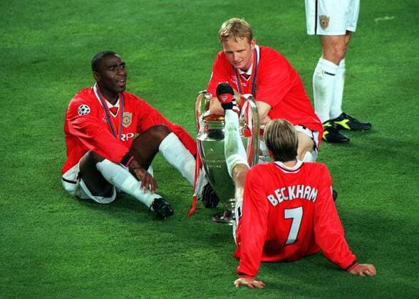 Andy Cole, David May and David Beckham (Manchester) celebrate with the Champions League trophy. Manchester United 2:1 Bayern Munich, Champions League Cup Final, 26 05 1999. Barcelona. 
