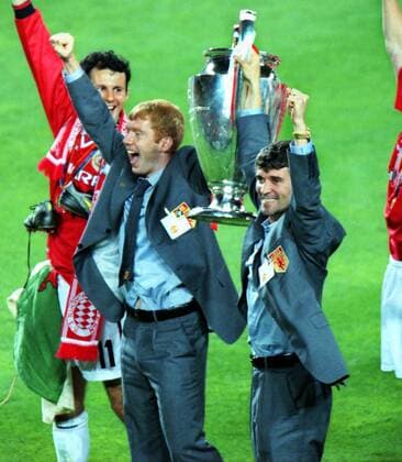 Football : Paul Scholes and Roy Keane (United) who missed playing in the final,celebrate with the trophy. Manchester United v Bayern Munich, Champions League Cup Final; 26 05 1999; Barcelona 