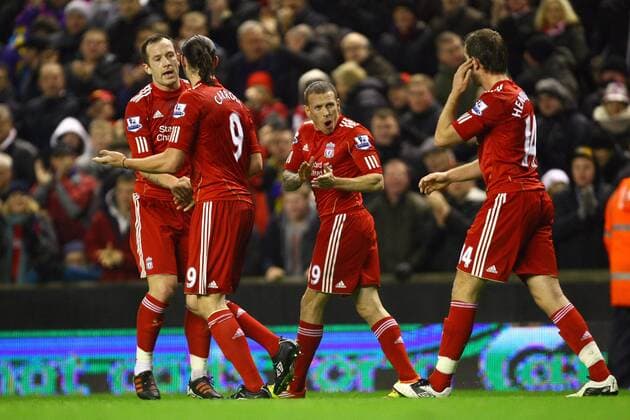 Football - Premier League - FC Liverpool vs. Newcastle Craig Bellamy of FC Liverpool eggs on his team mates following his equalising goal at Anfield 