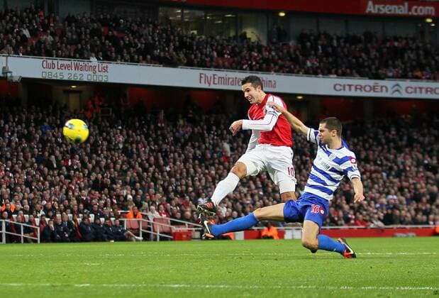 FC Arsenals Robin Van Persie fires in a shot Barclays Premier League FC Arsenal v Queens Park Rangers at the Emirates, London 31st December, 2011 EDITORIAL USE ONLY. No use with unauthorised audio, video, data, fixture lists, club league logos or live services. Online in-match use limited to 120 images, no video emulation. No use in betting, games or single club league player publications.