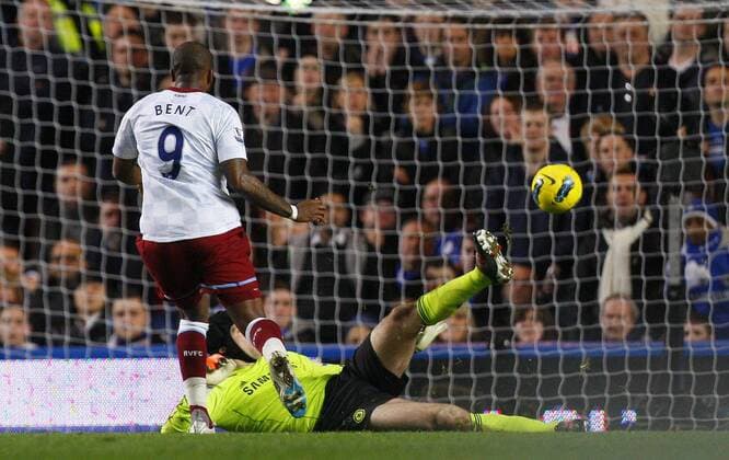 Darren Bent of Aston Villa scores his side s third goal Barclays Premier League FC Chelsea v Aston Villa at Stamford Bridge, London 31st December, 2011 EDITORIAL USE ONLY. No use with unauthorised audio, video, data, fixture lists, club league logos or live services. Online in-match use limited to 120 images, no video emulation. No use in betting, games or single club league player publications.