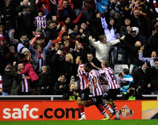 Ji Dong-Won (L) of Sunderland celebrates scoring his late winner. Barclays Premier League Sunderland v Manchester City at The Stadium of Light, Sunderland 1st January, 2012 EDITORIAL USE ONLY. No use with unauthorised audio, video, data, fixture lists, club league logos or live services. Online in-match use limited to 120 images, no video emulation. No use in betting, games or single club league player publications.
