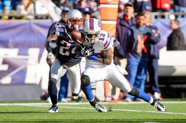 Jan. 1, 2012 - Foxborough, Massachusetts, U.S - Buffalo WR Steve Johnson (13) drops the ball while New England Patriots CB Kyle Arrington (24) goes to tackle him in the first half. The Buffalo Bills lead the New England Patriots 21 - 14 after the half at Gillette Stadium. NFL American Football Herren USA 2011 - Jan 1 - Buffalo Bills vs New England Patriots - ZUMAq39