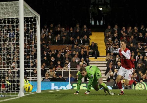 Arsenals Aaron Ramsay watches as his shot hits the post Barclays Premier League Arsenal v Queens Park Rangers at the Emirates, London 31st December, 2011 EDITORIAL USE ONLY. No use with unauthorised audio, video, data, fixture lists, club league logos or live services. Online in-match use limited to 120 images, no video emulation. No use in betting, games or single club league player publications.