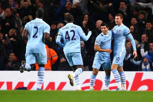 Football - Premier League - Manchester City vs. Liverpool Sergio Kun Aguero of Manchester City celebrates his opening goal at the Etihad Stadium 