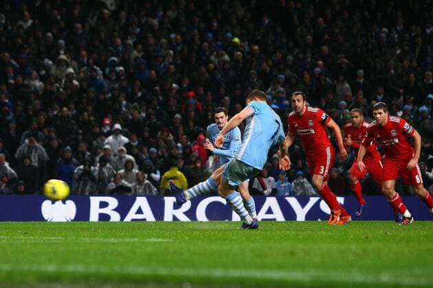 Football - Premier League - Manchester City vs. Liverpool James Milner of Manchester City scores from the penalty spot at the Etihad Stadium 