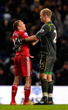 Craig Bellamy of Liverpool and Joe Hart of Manchester City Barclays Premier League Manchester City v Liverpool at the Etihad Stadium, Manchester 3rd January, 2012 EDITORIAL USE ONLY. No use with unauthorised audio, video, data, fixture lists, club league logos or live services. Online in-match use limited to 120 images, no video emulation. No use in betting, games or single club league player publications.