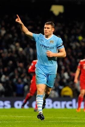 James Milner of Manchester City celebrates scoring the third goal Barclays Premier League Manchester City v Liverpool at the Etihad Stadium, Manchester 3rd January, 2012 EDITORIAL USE ONLY. No use with unauthorised audio, video, data, fixture lists, club league logos or live services. Online in-match use limited to 120 images, no video emulation. No use in betting, games or single club league player publications.