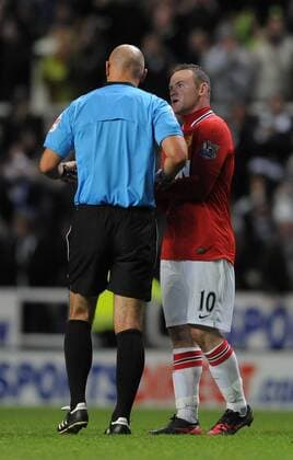 Wayne Rooney (R) of Manchester United complains to referee Howard Webb of foul missed leading up to Newcastle s first goal. Barclays Premier League Newcastle United v Manchester United at The Sports Direct Arena, Newcastle upon Tyne 4th January, 2012 EDITORIAL USE ONLY. No use with unauthorised audio, video, data, fixture lists, club league logos or live services. Online in-match use limited to 120 images, no video emulation. No use in betting, games or single club league player publications.