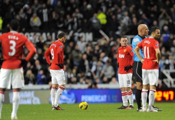 Manchester United players look dejected after conceding a goal to Newcastle United. Barclays Premier League Newcastle United v Manchester United at The Sports Direct Arena, Newcastle upon Tyne 4th January, 2012 EDITORIAL USE ONLY. No use with unauthorised audio, video, data, fixture lists, club league logos or live services. Online in-match use limited to 120 images, no video emulation. No use in betting, games or single club league player publications.