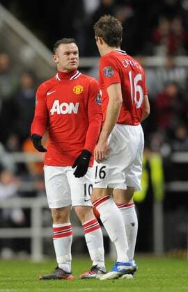 Wayne Rooney of Manchester United (L) amd Michael Carrick of Manchester United discuss defensive frailties after conceding a goal to Newcastle United. Barclays Premier League Newcastle United v Manchester United at The Sports Direct Arena, Newcastle upon Tyne 4th January, 2012 EDITORIAL USE ONLY. No use with unauthorised audio, video, data, fixture lists, club league logos or live services. Online in-match use limited to 120 images, no video emulation. No use in betting, games or single club league player publications.