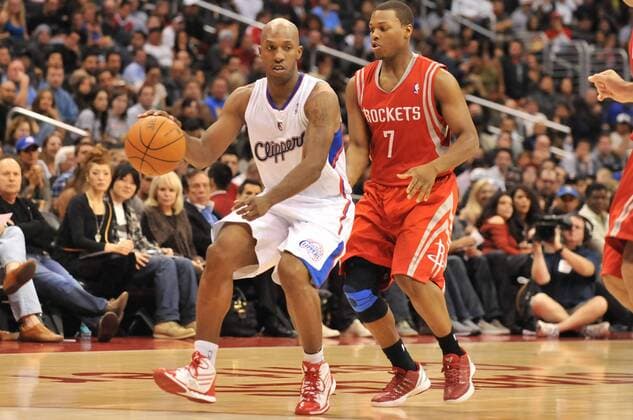 January 4, 2012 Los Angeles, CA..Clippers Chauncey Billups 1 dribbles past Rockets Kyle Lowry 7 during the NBA Basketball Herren USA Basketball game between the Houston Rockets and the Los Angeles Clippers at Staples Center in Los Angeles. The Clippers defeated the Rockets, 117-89. NBA Basketball Herren USA 2012: Rockets vs Clippers JAN 04 - ZUMAct7