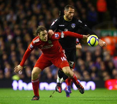 Football - FA Cup Third Round - Liverpool vs. Oldham Athletic Sebastian Coates of Liverpool battles with Oldham s Shefki Kuqi at Anfield 