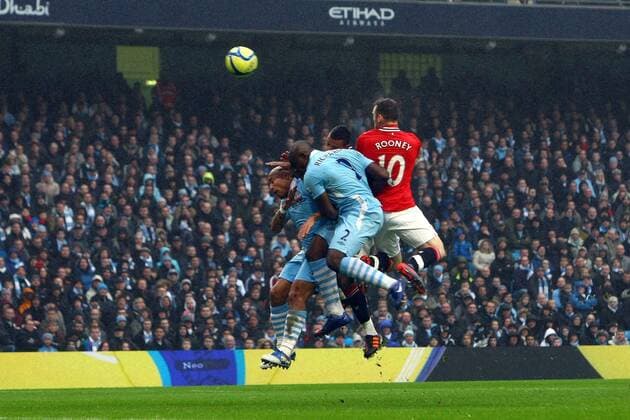 Football - FA Cup Third Round - Manchester City vs. Manchester United Wayne Rooney of Manchester United opens the scoring with his first goal at the Etihad Stadium 