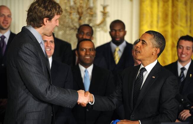 U.S. President Barack Obama shakes hands with Dallas Mavericks Dirk Nowitzki, of Germany, during a ceremony honoring the 2011 NBA Basketball Herren USA Champions in the East Room of the White House on January 9, 2012 in Washington, DC. Obama shared some laughs as he congratulated Dallas for their first National Basketball League Championship.  WAP20120109103
