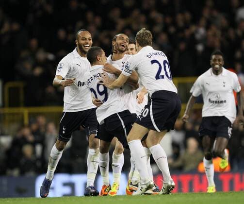 Tottenhams Benoit Assou-Ekotto celebrates scoring his sides second goal Tottenham v Everton in the the Barclays Premiership, at the White Hart Lane, London. 11th January 2012 EDITORIAL USE ONLY. No use with unauthorised audio, video, data, fixture lists, club league logos or live services. Online in-match use limited to 120 images, no video emulation. No use in betting, games or single club league player publications.