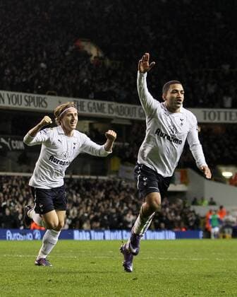 Tottenhams Aaron Lennon celebrates scoring his sides opening goal Tottenham v Everton in the the Barclays Premiership, at the White Hart Lane, London. 11th January 2012 EDITORIAL USE ONLY. No use with unauthorised audio, video, data, fixture lists, club league logos or live services. Online in-match use limited to 120 images, no video emulation. No use in betting, games or single club league player publications.