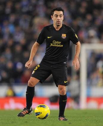 FUSSBALL INTERNATIONAL PRIMERA DIVISION SAISON 2011 2012 18. Spieltag RCD Espanyol Barcelona - FC Barcelona 08.01.2012 Xavi Hernandez (Barca) am Ball 