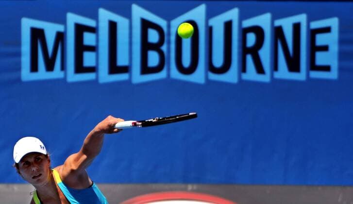 Lepchenko Varvara of the United States serves during the 1st round of women s singles match on day 1 of 2012 Australian Open tennis tournament at Melbourne Park 