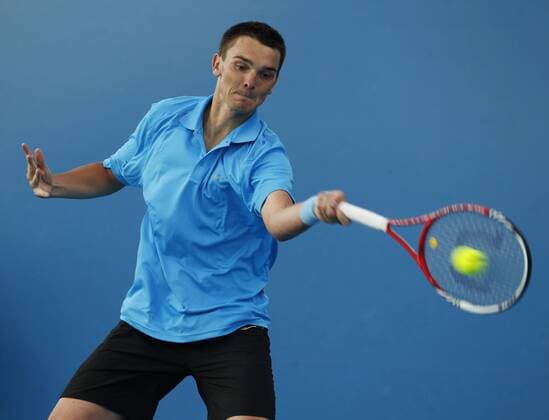 Australian Open 2012, Melbourne Park,ITF Grand Slam Tennis Tournament,Andreas Beck (GER) Aktion,Einzelbild, Halbkoerper,Querformat,