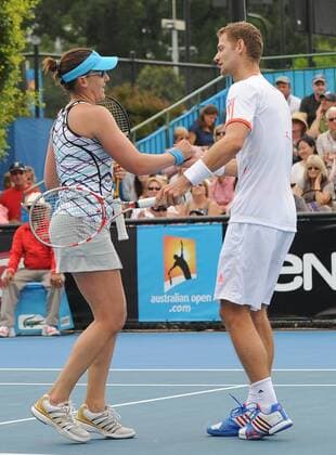 MELBOURNE, Jan. 20, 2012 -- Abigail Spears (L) of the United States Mariusz Fyrstenberg of Poland celebrate after beating Peng Shuai of China Jamie Murray of Britain in the first round mixed doubles match at 2012 Australian Open tennis championships in Melbourne, Australia, Jan. 20, 2012. 