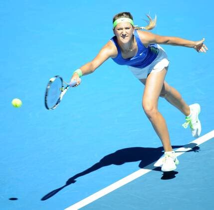 MELBOURNE, Jan. 22, 2012 -- Victoria Azarenka of Belarus hits a return during the women s singles match at the 2012 Australian Open tennis tournament in Melbourne, Australia, Jan. 22, 2012. 