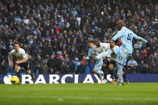 Football - Premier League - Manchester City vs. Tottenham Hotspur Mario Balotelli of Manchester City converts a late penalty to secure victory at the Etihad Stadium 
