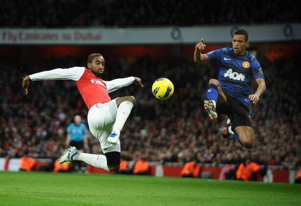 Football - Premier League - Arsenal vs. Manchester United Johan Djourou (Arsenal) Nani (Man Utd) 