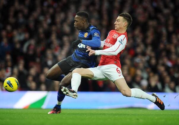 Football - Premier League - Arsenal vs. Manchester United Laurent Koscielny (Arsenal) Danny Welbeck (Man Utd) 