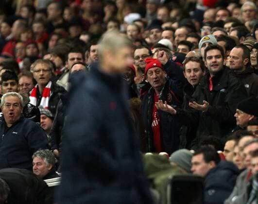 Arsenal v Manchester United . . 22.01.12 Arsenal fans berate Arsene Wenger, Arsenal manager, after taking off Alex Oxlade-Chamberlain. 