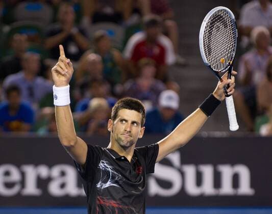 MELBOURNE, Jan. 23, 2012 - Novak Djokovic of Serbia celebrates during the fourth round match of men s singles at the Australian Open tennis tournament in Melbourne, Jan. 23, 2012. 