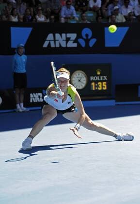 24.01.2012 Melbourne, Australia. Clijsters in action on Day 9 of the women s quarter final match. Kim Clijsters (BEL) on Rod Laver Arena at the Australian Open xPeterxBlakemanx  ActionPlus11238190