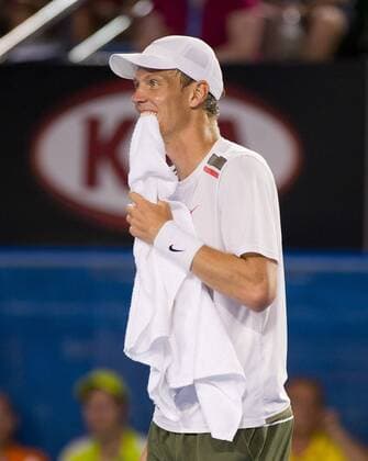 MELBOURNE, Jan. 24, 2012 -- Tomas Berdych of the Czech Republic reacts during the men s singles quarterfinals match at the 2012 Australian Open tennis tournament in Melbourne, Australia, Jan. 24, 2012. 