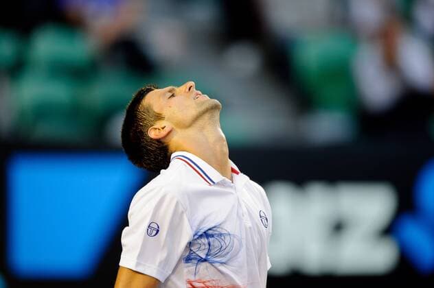 Jan. 25, 2012 - Melbourne, Victoria, Australia - Novak Djokovic (SRB) in action during a men s quarterfinals match on day ten of the 2012 Australian Open at Melbourne Park, Australia. TENNIS 2012 - Australian Open 2012 - Day 10 - ZUMAx35