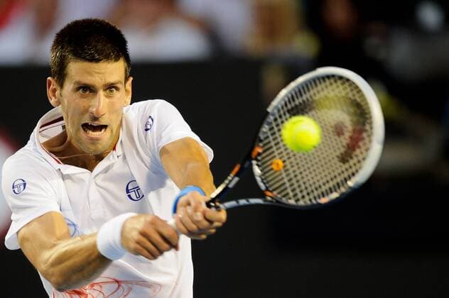 Jan. 25, 2012 - Melbourne, Victoria, Australia - Novak Djokovic (SRB) in action during a men s quarterfinals match on day ten of the 2012 Australian Open at Melbourne Park, Australia. TENNIS 2012 - Australian Open 2012 - Day 10 - ZUMAx35