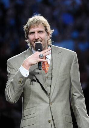January 25, 2012: Dallas Mavericks power forward Dirk Nowitzki 41 shows his ring during the championship ring ceremony before an NBA Basketball Herren USA game between the Minnesota Timberwolves and the Dallas Mavericks at the American Airlines Center in Dallas, TX Minnesota defeated Dallas 105-90 NBA Basketball Herren USA JAN 25 Timberwolves at Mavericks Icon2012012501 EDITORIAL USE ONLY