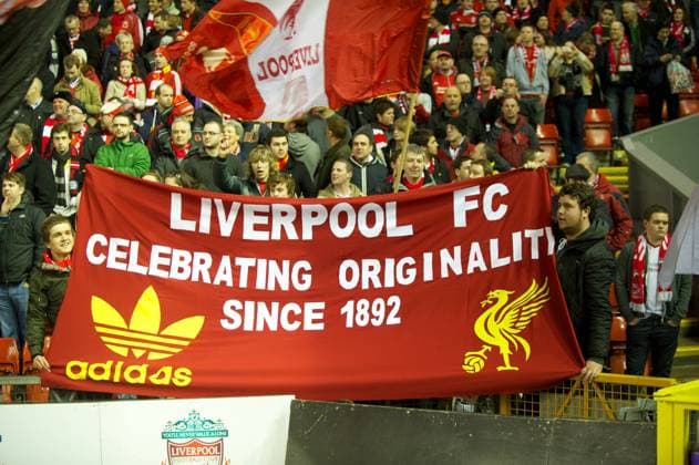 Liverpool supporters on the Spion Kop with a banner Liverpool FC Celebrating Originality Since 1892 during the Football League Cup Semi-Final 2nd Leg at Anfield. xHOCHxZWEIx xPropagandax 