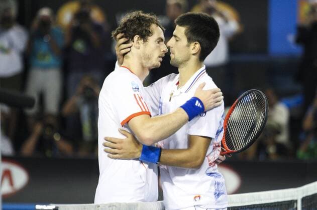 27 January 2012 : Novak Djokovic (SRB) left and Andy Murray (GBR) right, hug and embrace after an exhausting and thrilling 5 set match during Day 12 of the Mens Semifinals of the Australian Tennis open grand slam event at Melbourne Park, Melbourne Australia. TENNIS: JAN 27 Australian Open Icon12012722 EDITORIAL USE ONLY
