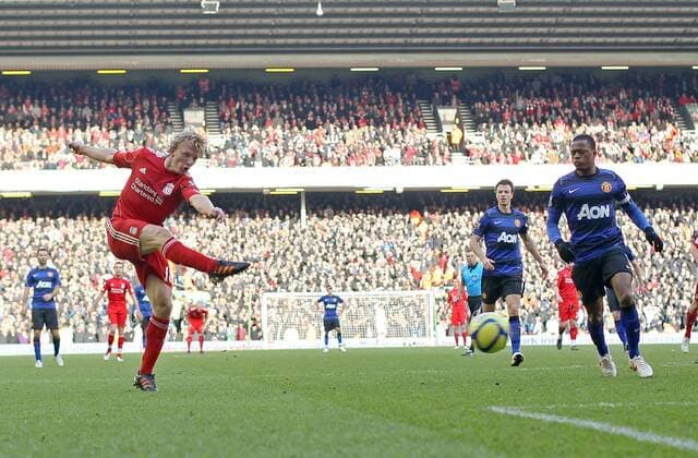 Liverpools Dirk Kuyt scoring his sides winning goal..Liverpool v Manchester United in the the FA Cup Fourth Round sponsored by Budweiser at Anfireld, Liverpool. 28th January 2012. EDITORIAL USE ONLY. No use with unauthorised audio, video, data, fixture lists, club league logos or live services. Online in-match use limited to 120 images, no video emulation. No use in betting, games or single club league player publications.